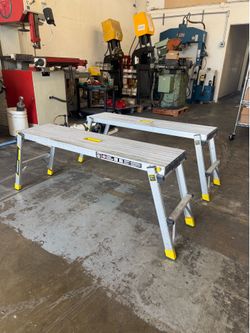 Pair of Gorilla Ladder folding work bench