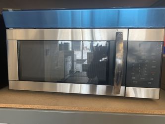 Brand New Over The Range Microwave