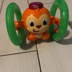 Baby toy - rolling monkey