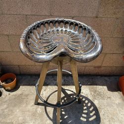 HEAVY DUTY SWIVEL Iron and Wood Vintage Tractor Bar Stool (1) 33 inches tall and the seat is 18 inches wide. Fun decor.