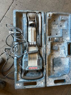 Bosh demolition hammer with bit and cover