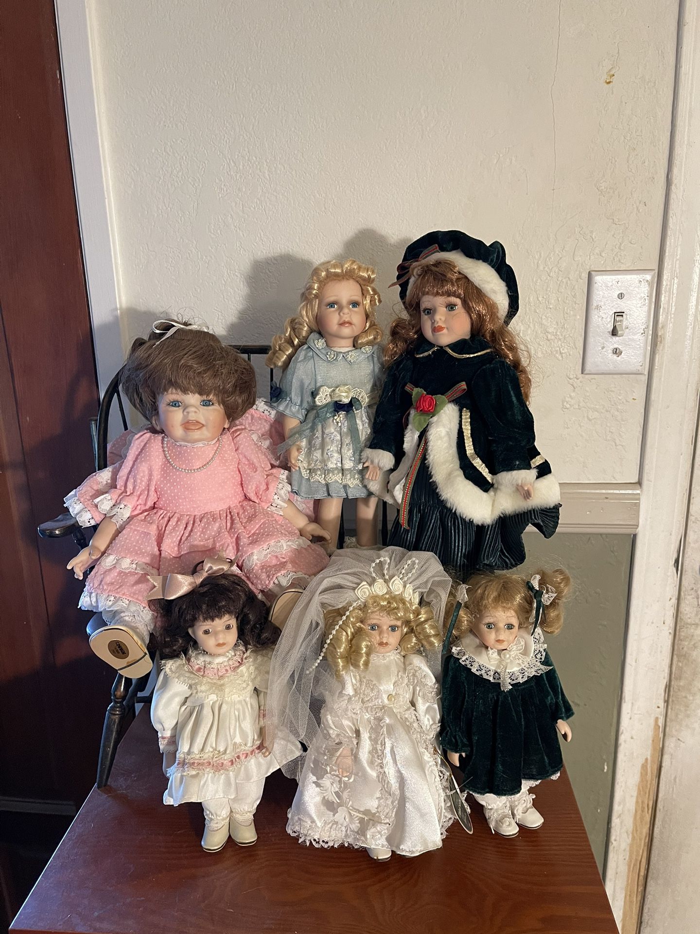 12 Porcelain Dolls All For $25