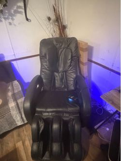 Black leather massage chair