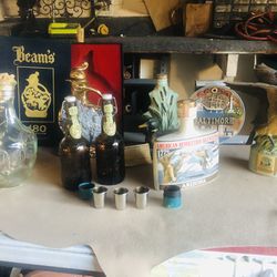 A collection of antique drinking bottles