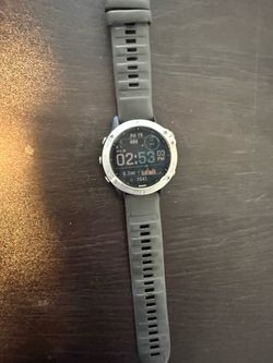 Garmin Fenix 6 with charging cord