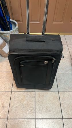 26 inches check in Delsey luggage