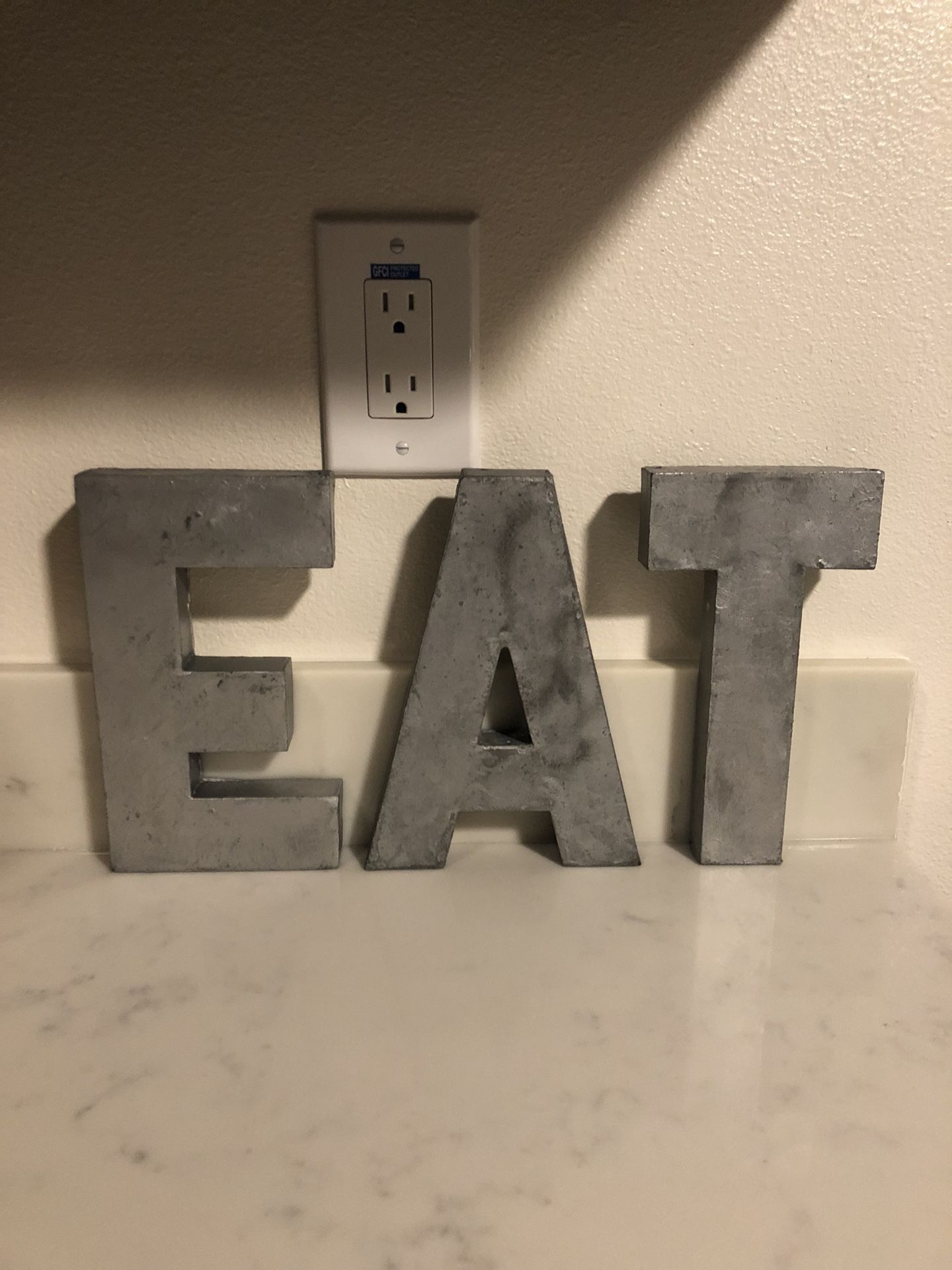 Anthropologie metal letters