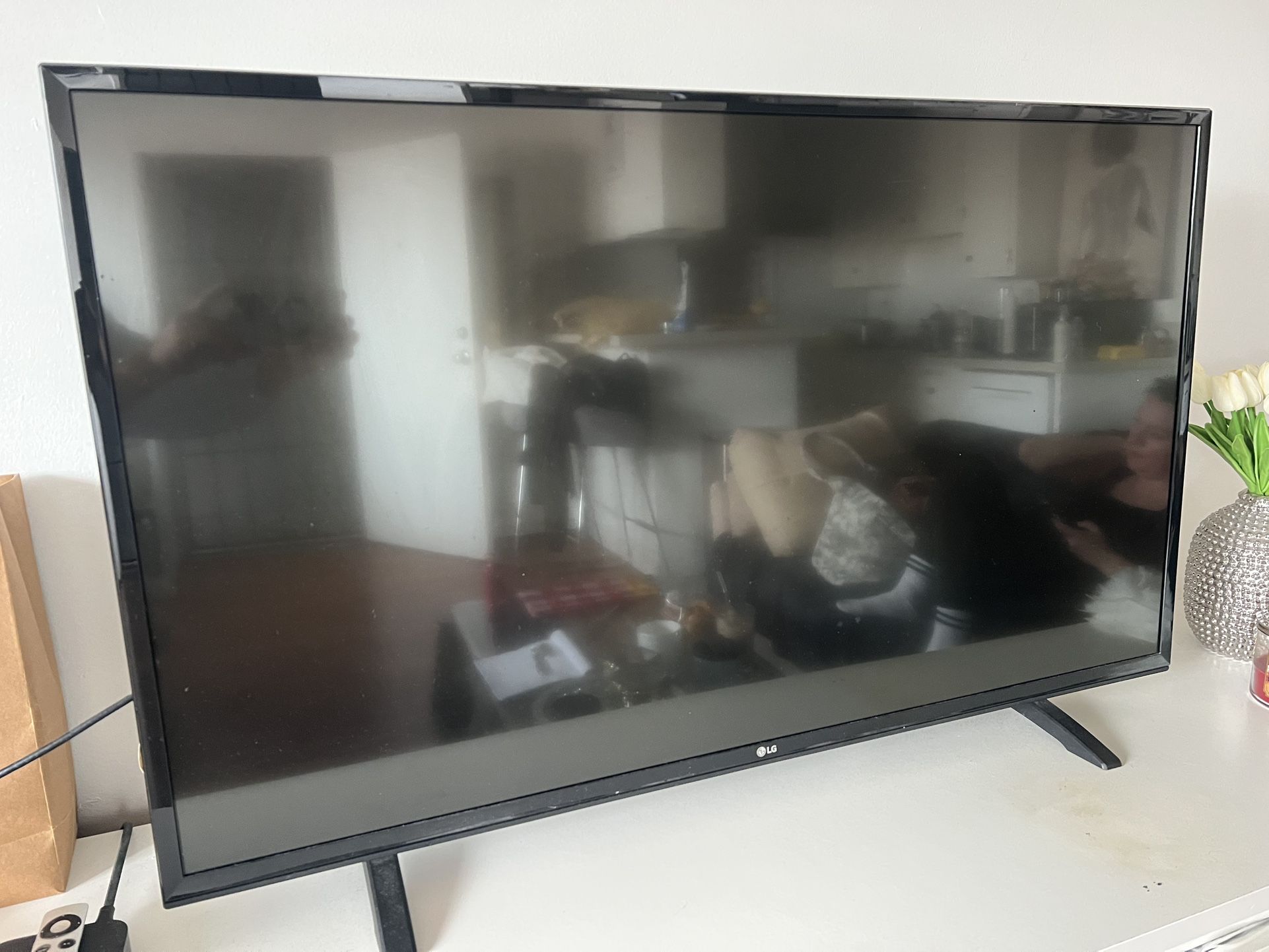 LG TV with LG Remote Control And APPLE TV