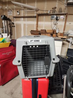 Sky Kennel Pet Travel Crate with additional carry gadgets never used