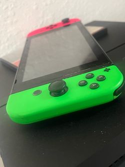 Nintendo Switch with Neon Green and Pink Joy-Cons