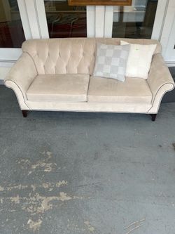 Nail trim cream velvet tufted couch (in store)
