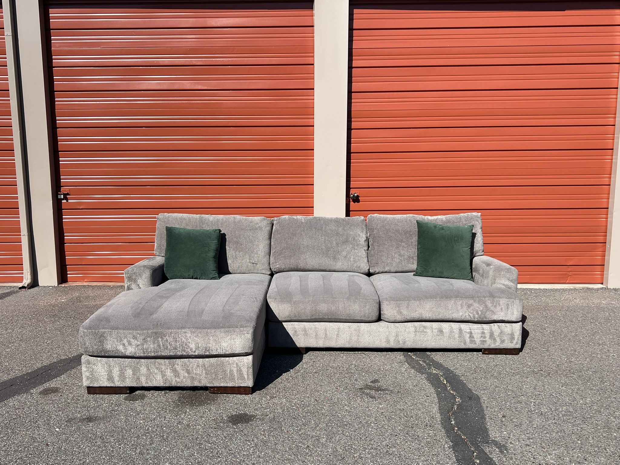 Comfortable Ashley's Gray Sectional Sofa Couch with left facing chaise