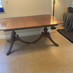 Solid wood table With Extending Panels $60
