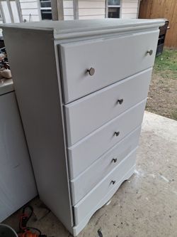 Dresser with hidden compartment 