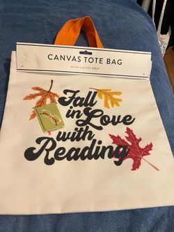 Brand New! Canvas tote bag with the words 'Fall in Love with Reading'