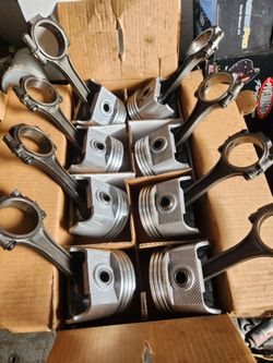 GM 283 / 327 https://offerup.com/redirect/?o=Qy5JLm5ldw== pistons in the box pressed on reconditioned rods.