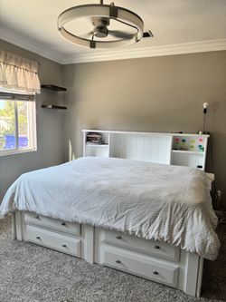 White wooden bed frame