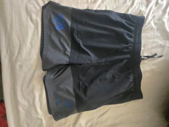Rams Nike Athletic Shorts with Blue Logo