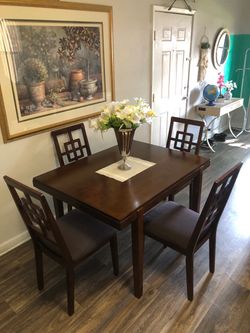 Ashley Furniture solid wood dining table set with 4 fabric chairs
