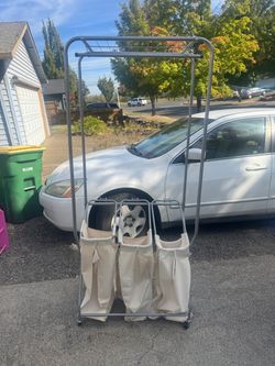 Laundry cart with hanger bar