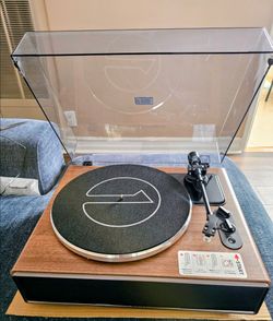 Brown  turntable with built in speakers