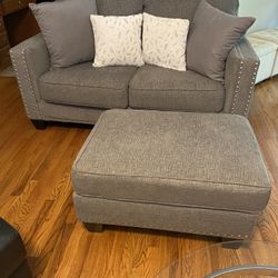 ASHLEY FURNITURE GREY LOVESEAT & OTTOMAN