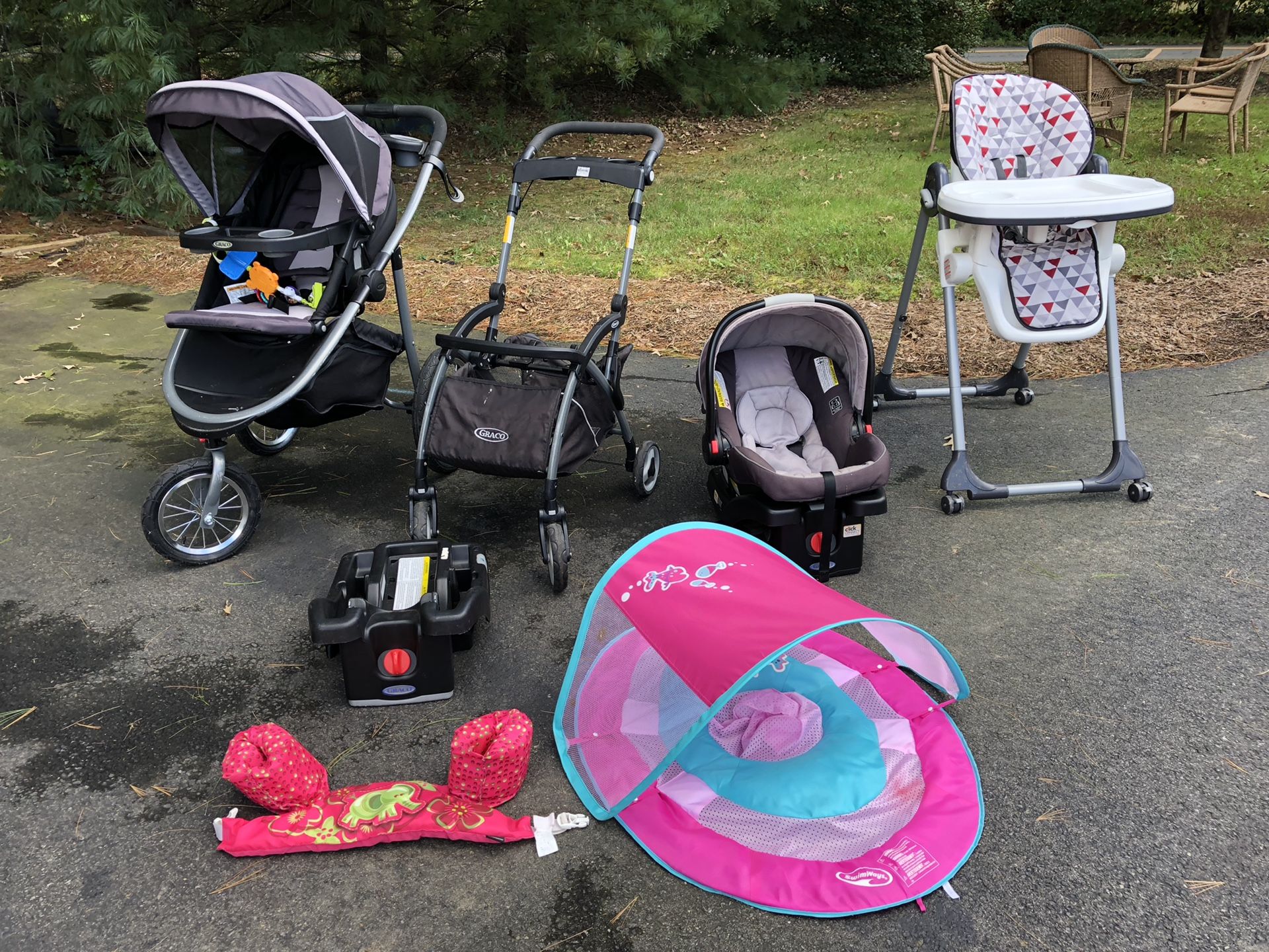 Car seat and high chair and two strollers