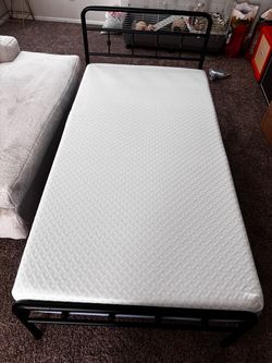 Twin bed frame and foam mattress