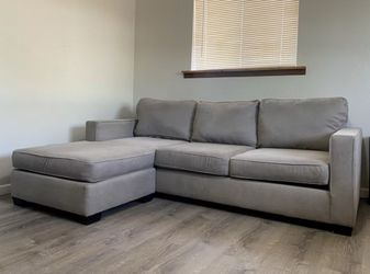 Light Gray Reversible 92in Chaise Living Spaces Sectional Sofa
