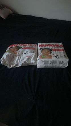 Huggie size 4 diapers  1 ok of 27 and another  ok of 27 minus a few  gone