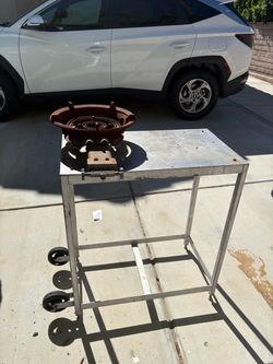 Stainless steel table with gas burner