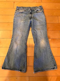 Vintage Orange Tagged Flared Levi's 501 blue jeans, Size 28"