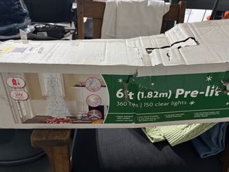 6 foot pre-lit white Christmas tree $10