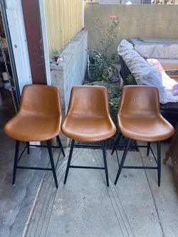 Three bar stools