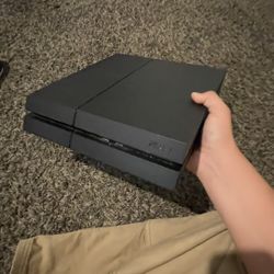 PS4 BASICALLY NEVER USED - WITH CORDS