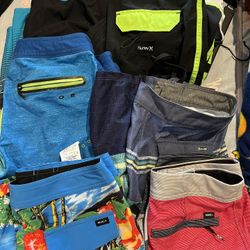 6 Pairs Of Size 27 Board Shorts.