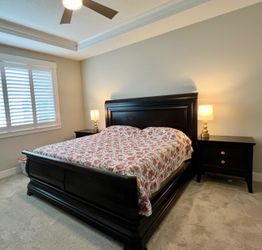 Cal King wooden bed frame with night stand
