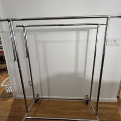 Double Clothes Hanging Rack With Extendable Ends .