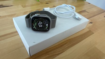 New, Open Box Apple Watch Ultra 2 49MM Natural Titanium with Titanium Milanese Band - 100% battery health.