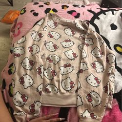 2 hello kitty sweaters medium and large for trade