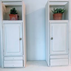 Two Off White Matching Tall painted wood wall cabinet open shelf & drawers 