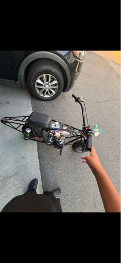 650$ MINI BIKE FRP MODDED GTS STRAIGHT PIPE, WHEELIE BAR AND GAS TANK RUNS GOOD 55MPH LMK ASAP!!!
