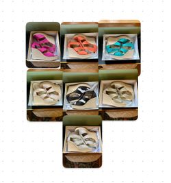 Seven Pairs of Michael Kors Damita Canvas Wedges