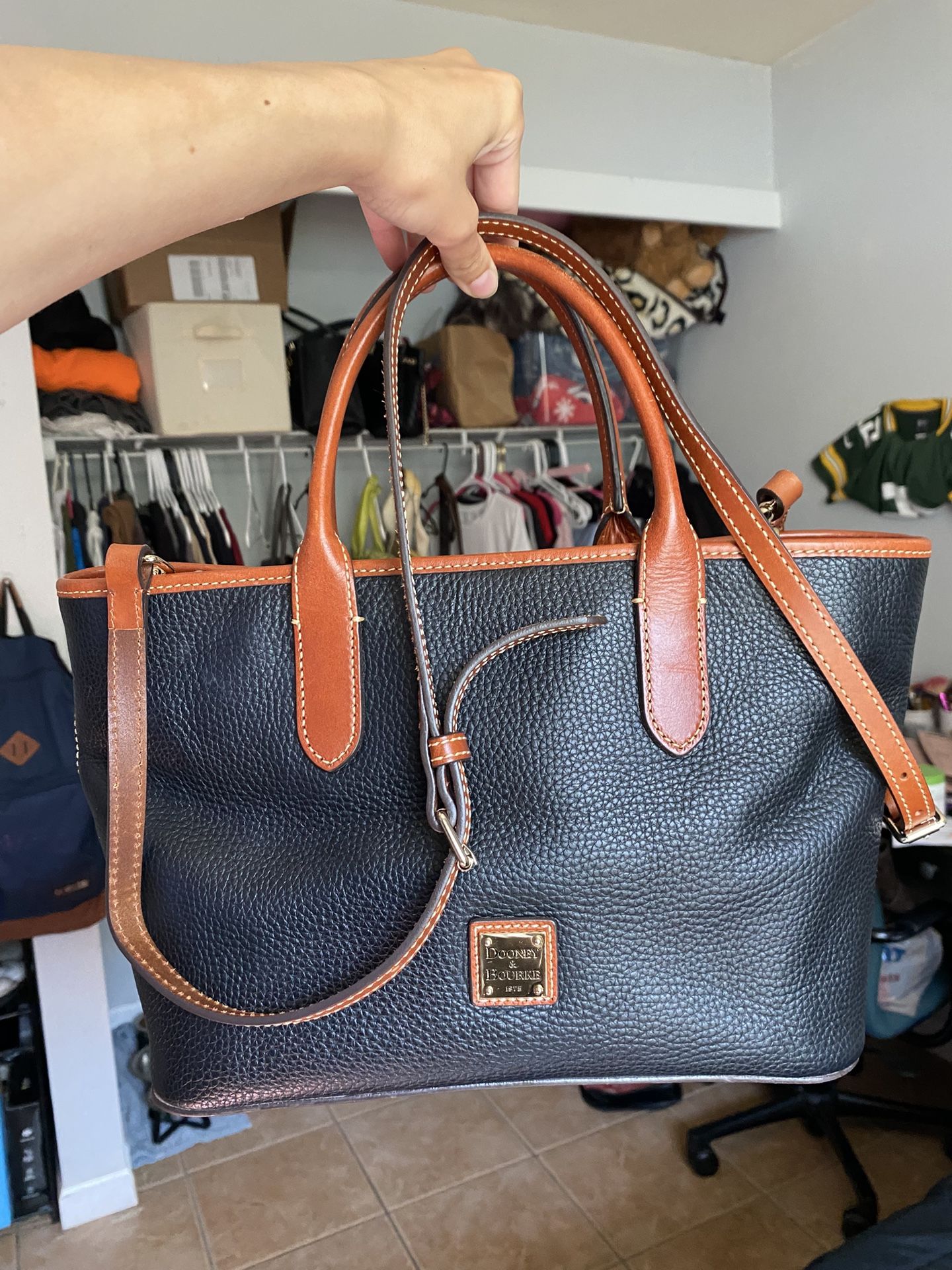 Dooney & Bourke Pebble Grain Brielle satchel purse hand bag with brown leather trim. Bright red interior