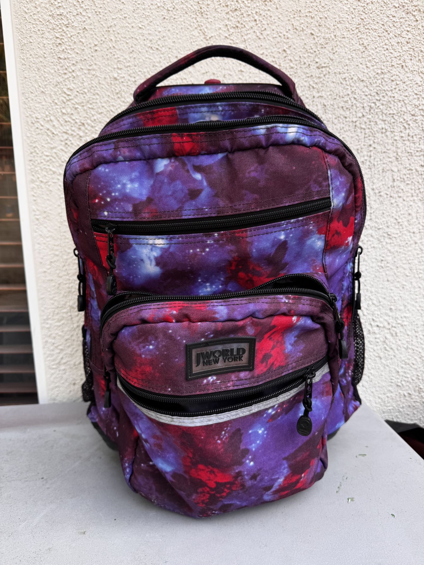 J World Rolling Backpack