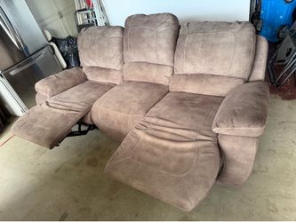 Brown reclining couch