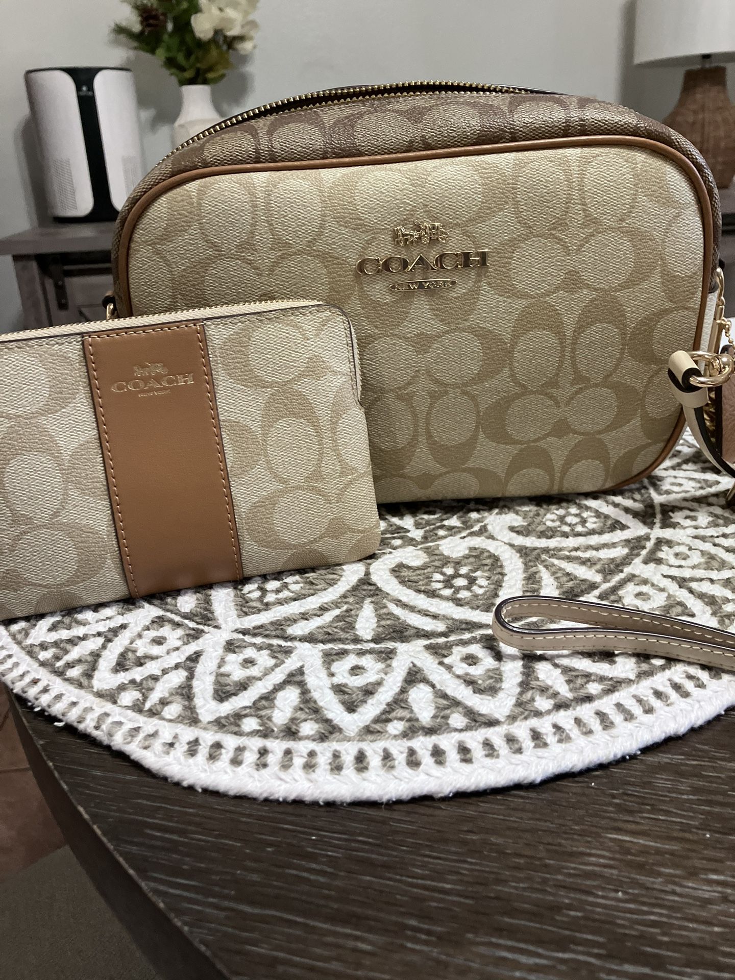 Coach crossbody camera bag and wallet.