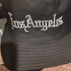 Brand new with a black or white Los Angeles bucket, hat, Me, and or Women