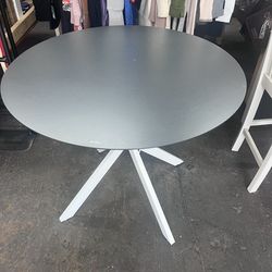 Black and White Round Metal Outdoor Dining Table with Glass Top