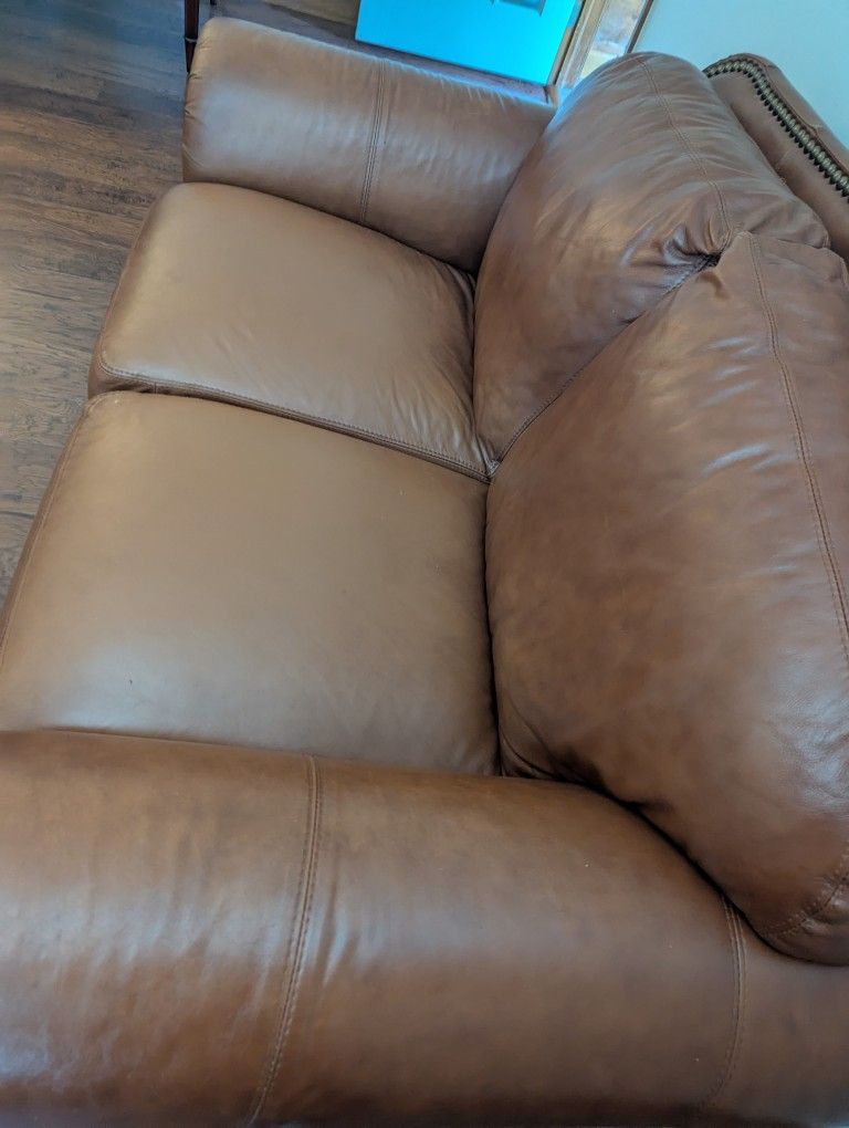 vintage leather loveseat see pics